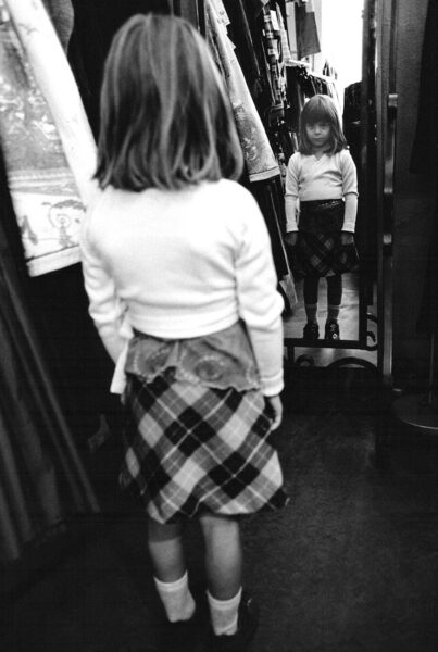 Patricia looking in mirror, Berlin, Germany