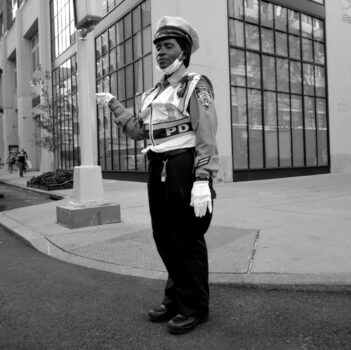 Police Officer with Eyes Closed, Chelsea, NYC