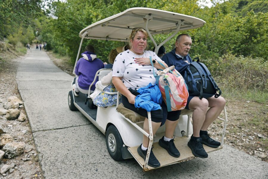 Sunburnt Woman in Golf Cart, Lopud, Croatia
