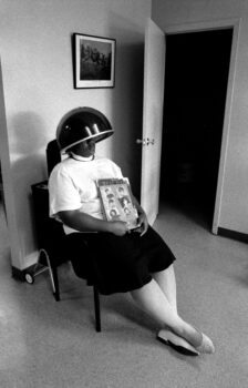 Woman Under Hair Dryer in Beauty Salon, Newark, NJ